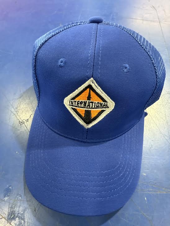 INTERNATIONAL CURVED BILL PATCH HAT BLUE (Copia) (Copia) (Copia) Tractolaser