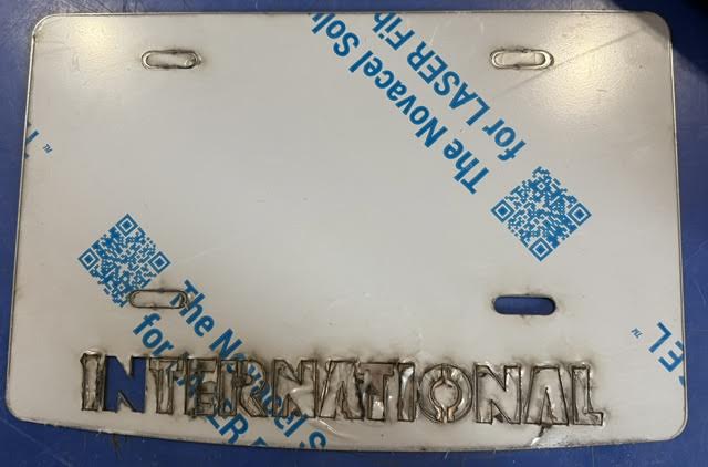 INTERNATIONAL LOGO License Plate Frame - Stainless Tractolaser