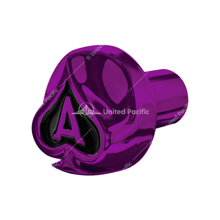Purple metal valve stem cap with ace of spades design on a white background
